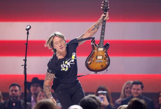 Keith Urban performs onstage during the 59th CMA Awards at the Bridgestone Arena in Nashville, Tennessee, on Wednesday, November 19, 2025.  NAS20251119291 JOHNxANGELILLO