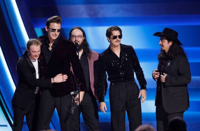 (L-R) Andrew Nix, Andrew Bishop, John Hall, Brandon Coleman and Sevans Henderson of The Red Clay Strays accept the award for Vocal Group of the Year onstage during the 59th CMA Awards at the Bridgestone Arena in Nashville, Tennessee, on Wednesday, November 19, 2025.  NAS20251119330 JOHNxANGELILLO