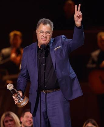 Vince Gill accepts the Lifetime Achievement Award onstage during the 59th CMA Awards at the Bridgestone Arena in Nashville, Tennessee, on Wednesday, November 19, 2025.  NAS20251119362 JOHNxANGELILLO