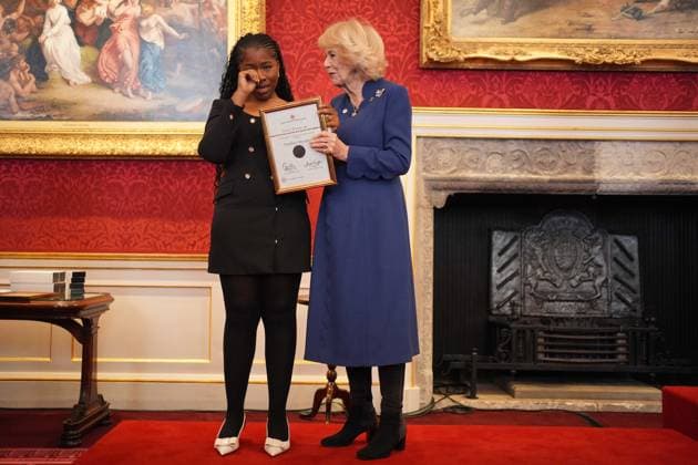 The Queen s Commonwealth Essay Competition 2025 Queen Camilla presents Senior Runner-Up, Pandora Onyedire, 17, from Lagos, Nigeria, with a certificate, during a reception to celebrate the winners of the Queen s Commonwealth Essay Competition at St James Palace in London. Picture date: Thursday November 20, 2025., Credit:Yui Mok Avalon UK, London  Copyright: xYuixMokx xAvalonx 1053550924