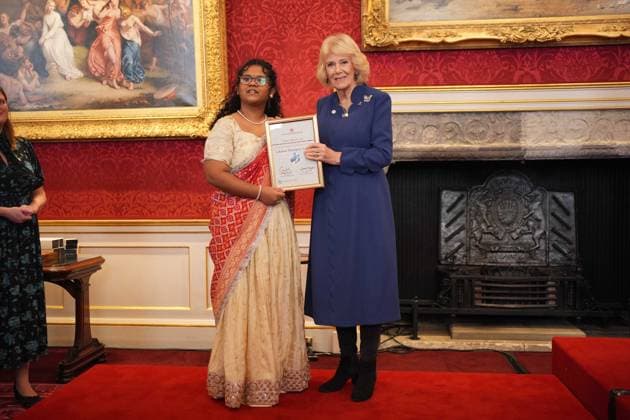 The Queen s Commonwealth Essay Competition 2025 Queen Camilla presents Junior Runner Up, Lakshmi Manognya Achanta, 14, from Singapore, with a certificate, during a reception to celebrate the winners of the Queen s Commonwealth Essay Competition at St James Palace in London. Picture date: Thursday November 20, 2025., Credit:Yui Mok Avalon UK, London  Copyright: xYuixMokx xAvalonx 1053550929