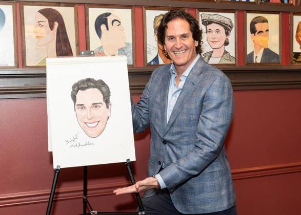 November 21, 2025, Bronx, New York, USA: Nick Scandalios, Executive Vice President of Nederlander Organization owner of many theaters on Broadway poses with his portrait during unveiling at Sardi s in New York, NY on November 21, 2025 Bronx USA - ZUMAr339 20251121_znp_r339_011 Copyright: xLevxRadinx