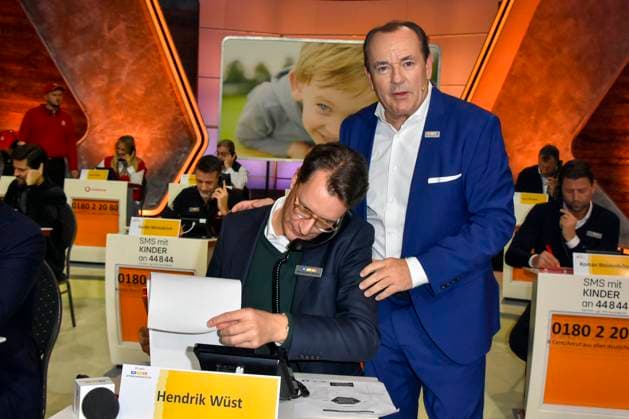 ABB Hendrik Josef Wüst Wuest CDU politician with Wolfram Kons Moderator State Premier of North Rhine-Westphalia North Rhine-Westphalia as a guest on the donation phone in the RTL studio at the charity for the 30th anniversary of the RTL telethon we help children at RTL Germany on 21 11 2025 2 Donation Day in Cologne Deutz NRW Germany