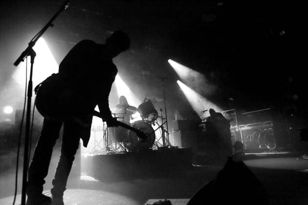 Robert Levon Been, Leah Shapiro and Peter Hayes, from left, of the band Black Rebel Motorcycle Club at a concert at the Astra Kulturhaus in Berlin, November 23, 2025 Photo converted to black and white Black Rebel Motorcycle Club concert Berlin