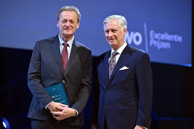 Professor Godefroid de Callatay of UC Louvain and King Philippe - Filip of Belgium pictured during the award ceremony of the five-year Scientific Excellence Awards awarded by the Fund for Scientific Research (FWO - FRS - FNRS), at Bozar in Brussels on Monday 24 November 2025.  ERICxLALMAND 143884894