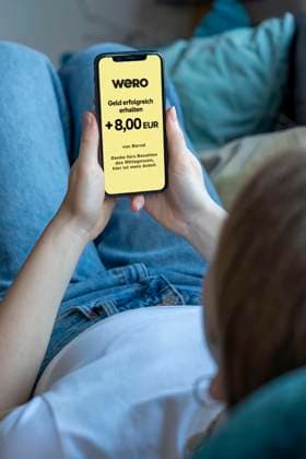 Symbolic image, photomontage, to the European WERO payment service, send money directly to or receive money from another person, P2P, person to person, WERO payment service