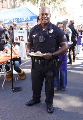 26 November 2025 - Los Angeles, California - Officer Deon Joseph,. 2025 Thanks & Giving On Skid Row held at Los Angeles Mission. Photo Copyright: xAdMediax
