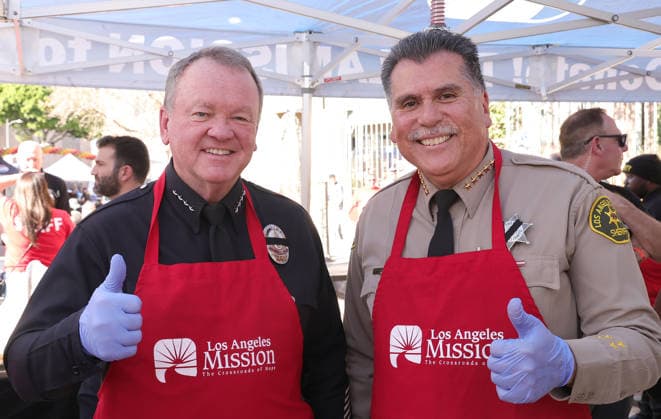 26 November 2025 - Los Angeles, California - Chief of the Los Angeles Police Department Jim McDonnell, Sheriff Robert G. Luna. 2025 Thanks & Giving On Skid Row held at Los Angeles Mission. Photo Copyright: xAdMediax