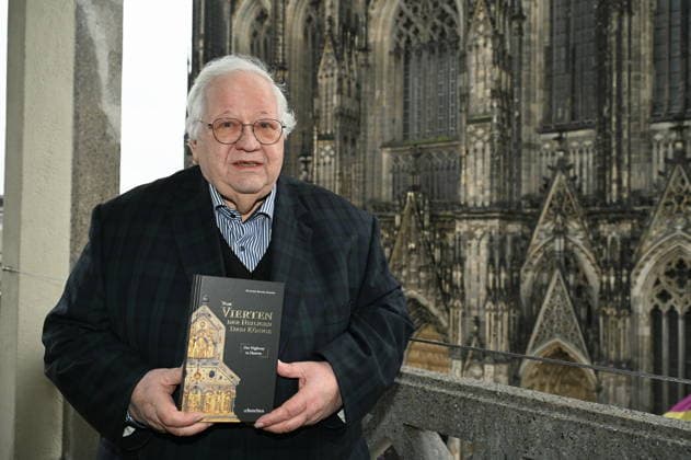 Author Prof Dr Theol Manfred Becker Huberti poses at the launch of his new book Vom Vierten der Heiligen Drei Könige (The Fourth of the Magi)