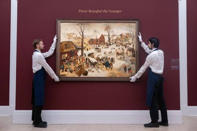 November 28, 2025, London, England, United Kingdom: Sotheby s staff members stand beside Pieter Brueghel the Younger s The Census at Bethlehem, estimated at 3,000,000-5,000,000 GBP, during a preview at Sothebys in London on 28 November 2025. The painting will be offered in the Old Masters and 19th Century Paintings sale on 3 December. London United Kingdom - ZUMAk172 20251128_zip_k172_027 Copyright: xThomasxKrychx