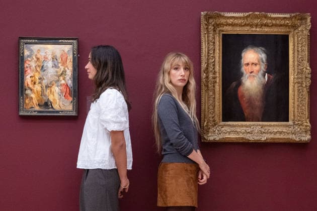 November 28, 2025, London, England, United Kingdom: Sotheby s staff members stand beside Sir Peter Paul Rubens The Virgin and Child with Saint Anne adored by Saints of the House of Habsburg, estimated at 2,000,000-3,000,000 GBP, and Portrait Study of an Old Man, estimated at 1,000,000-1,500,000 GBP, during a preview at Sotheby s in London on 28 November 2025. Both paintings will be offered in the Old Masters and 19th Century Paintings sale on 3 December. London United Kingdom - ZUMAk172 20251128_zip_k172_035 Copyright: xThomasxKrychx