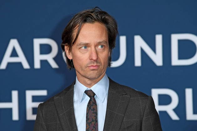 Tom Schilling at the festival opening of AROUND THE WORLD IN 14 FILMS at the cinema in the Kulturbrauerei in Berlin on 28 11 2025