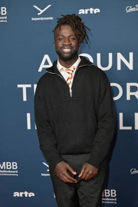 Mohamed Ndiaye at the festival opening and the premiere of the feature film Sentimental Value at the 20th Around the World in 14 Films festival at the KulturBrauerei cinema in Berlin, 28 11 2025 Foto:xM.xBehrensx xFuturexImagex world_5120