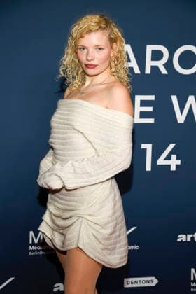 ABBberlin Luisa Celine Gaffron German actress on the red carpet at the festival opening AROUND THE WORLD IN 14 FILMS at Cinestar Kino in der Kulturbrauerei Berlin on 28 11 2025 Berlin Germany