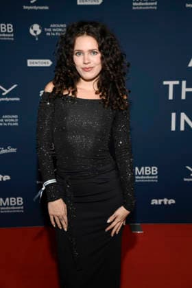 ABBberlin Marie Schnoell on the red carpet at the festival opening AROUND THE WORLD IN 14 FILMS at Cinestar Kino in der Kulturbrauerei Berlin on 28 11 2025 Berlin Germany