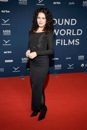 ABBberlin Marie Schnoell on the red carpet at the festival opening AROUND THE WORLD IN 14 FILMS at Cinestar Kino in der Kulturbrauerei Berlin on 28 11 2025 Berlin Germany