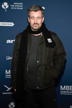 ABBberlin Christian Schwochow on the red carpet at the festival opening AROUND THE WORLD IN 14 FILMS at Cinestar Kino in der Kulturbrauerei Berlin on 28 11 2025 Berlin Germany