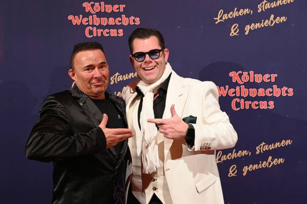 Presenter Markus Köllner and entertainer Dennis Schick, l r, attend the premiere of the 10th Cologne Christmas Circus