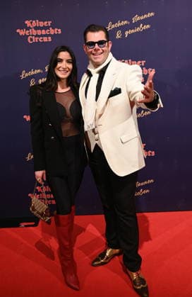Presenter and entertainer Dennis Schick and his wife Liliana attend the premiere of the 10th Cologne Christmas Circus
