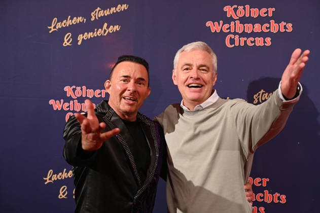 Presenter Markus Köllner, l r, and Andreas von Thien attend the premiere of the 10th Cologne Christmas Circus