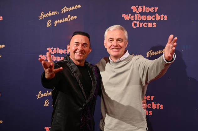 Presenter Markus Köllner, l r, and Andreas von Thien attend the premiere of the 10th Cologne Christmas Circus