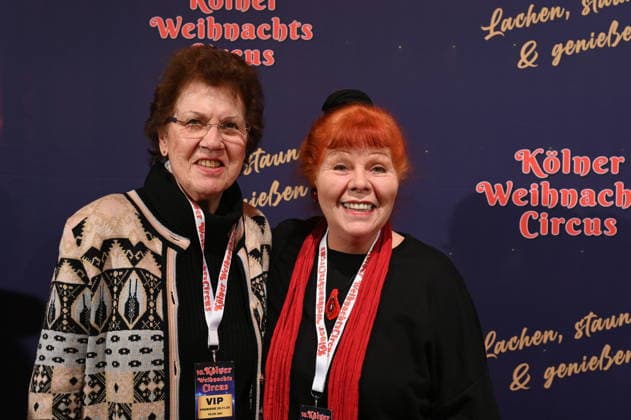 Actress Samy Orfgen , r, and her sister attend the premiere of the 10th Cologne Christmas Circus
