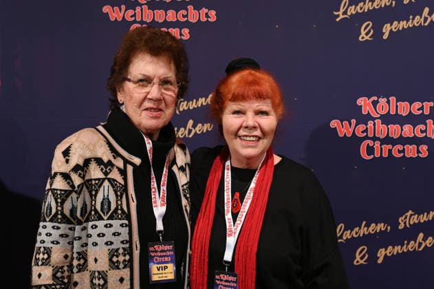 Actress Samy Orfgen , r, and her sister attend the premiere of the 10th Cologne Christmas Circus