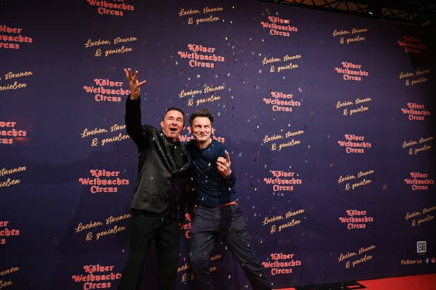 Presenter Markus Köllner and Andre Gatzke, l r, attend the premiere of the 10th Cologne Christmas Circus