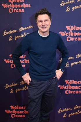 Presenter Andre Gatzke attends the premiere of the 10th Cologne Christmas Circus