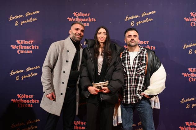Performers Rafi Rachek, Nina Baracai, Eddy Yildiz, l r, attend the premiere of the 10th Cologne Christmas Circus