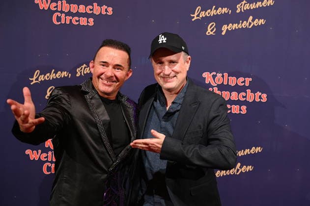 Presenter Markus Köllner and Olli Briesch , l r, attend the premiere of the 10th Cologne Christmas Circus