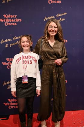 Actress Nadine Arents and daughter Maja attend the premiere of the 10th Cologne Christmas Circus