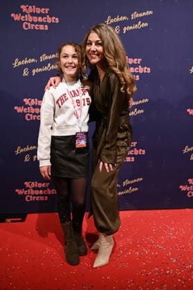 Actress Nadine Arents and daughter Maja attend the premiere of the 10th Cologne Christmas Circus
