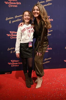 Actress Nadine Arents and daughter Maja attend the premiere of the 10th Cologne Christmas Circus