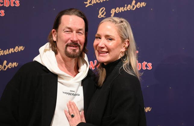 Actress Janine Kunze and her husband Dirk Burdach attend the premiere of the 10th Cologne Christmas Circus