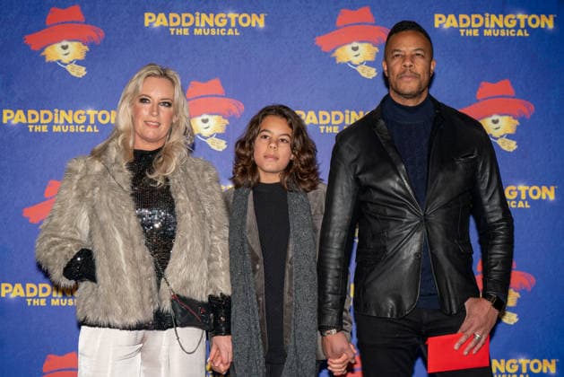 Paddington The Musical Word Premiere in London - 30 Nov 2025 L-R Ceri Ann Gregory, guest and Michael Wildman seen arriving on the Blue Carpet during the Paddington The Musical World Premiere opens in the West End, London. London United Kingdom Copyright: xBonniexBritainx xSOPAxImagesx BNS02160