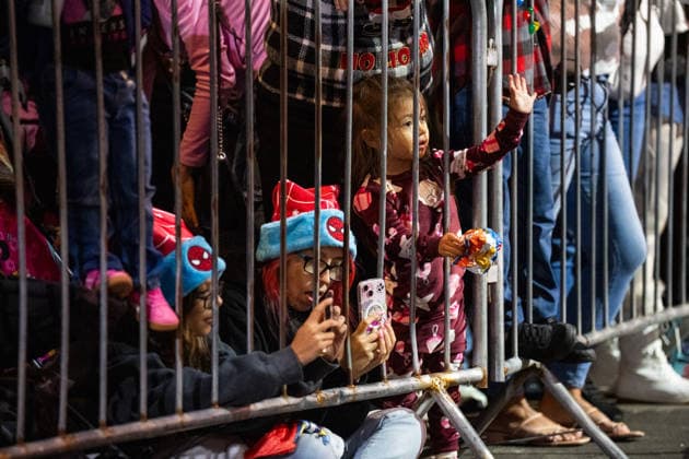 HOLLYWOOD, CALIFORNIA - NOVEMBER 30: A child cheers for performers during the 93rd Annual Hollywood Christmas Parade on November 30, 2025 in Hollywood, California.  Copyright: xVCGx 111606900229