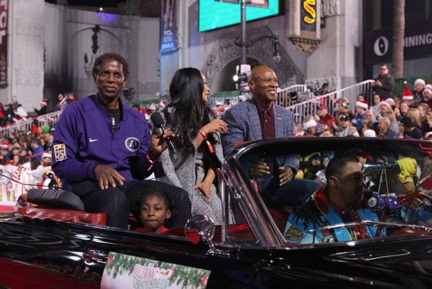 A. C. Green, Cecelia Scott and Byron Scott cruise down Hollywood Blvd. during The 93rd Annual Hollywood Christmas Parade With Grand Marshal Luke Wilson In Support of Marine Toys for Tots in Los Angeles on Sunday, November 30, 2025.  LAP20251130747 GERGxGRUDT