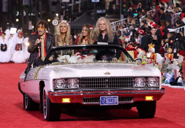 Jason Ebs, Janea Ebs, Suzanne Le Bach and Sebastian Bach cruise down Hollywood Blvd. during The 93rd Annual Hollywood Christmas Parade With Grand Marshal Luke Wilson In Support of Marine Toys for Tots in Los Angeles on Sunday, November 30, 2025.  LAP20251130749 GERGxGRUDT