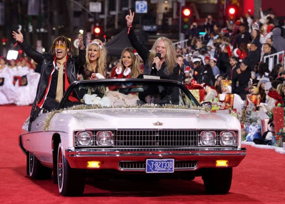 Jason Ebs, Janea Ebs, Suzanne Le Bach and Sebastian Bach cruise down Hollywood Blvd. during The 93rd Annual Hollywood Christmas Parade With Grand Marshal Luke Wilson In Support of Marine Toys for Tots in Los Angeles on Sunday, November 30, 2025.  LAP20251130750 GERGxGRUDT