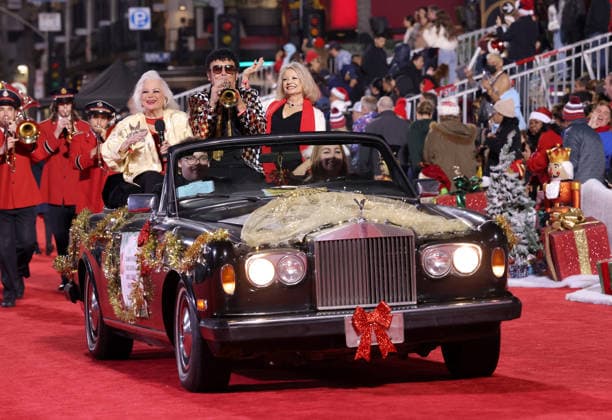 Carol Connors, David Longoria and Kathy Garver cruise down Hollywood Blvd. during The 93rd Annual Hollywood Christmas Parade With Grand Marshal Luke Wilson In Support of Marine Toys for Tots in Los Angeles on Sunday, November 30, 2025.  LAP20251130752 GERGxGRUDT