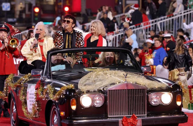 Carol Connors, David Longoria and Kathy Garver cruise down Hollywood Blvd. during The 93rd Annual Hollywood Christmas Parade With Grand Marshal Luke Wilson In Support of Marine Toys for Tots in Los Angeles on Sunday, November 30, 2025.  LAP20251130753 GERGxGRUDT