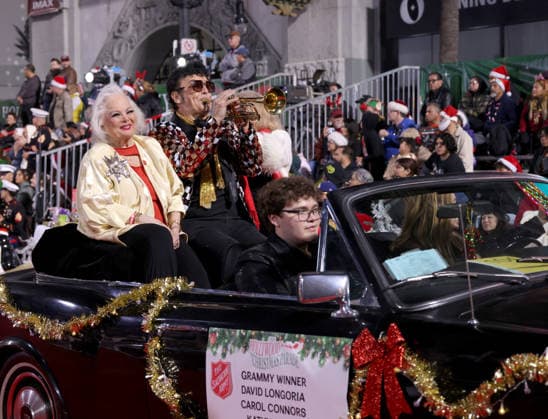 Carol Connors, David Longoria and Kathy Garver cruise down Hollywood Blvd. during The 93rd Annual Hollywood Christmas Parade With Grand Marshal Luke Wilson In Support of Marine Toys for Tots in Los Angeles on Sunday, November 30, 2025.  LAP20251130754 GERGxGRUDT