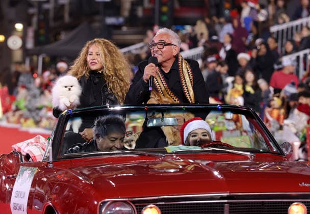 Connie Cossio and Cesar Millan cruise down Hollywood Blvd. during The 93rd Annual Hollywood Christmas Parade With Grand Marshal Luke Wilson In Support of Marine Toys for Tots in Los Angeles on Sunday, November 30, 2025.  LAP20251130765 GERGxGRUDT