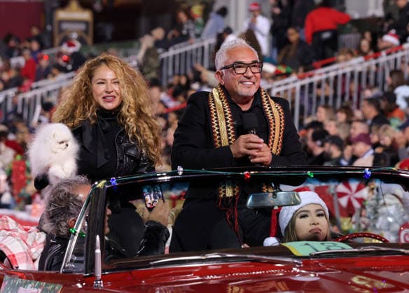 Connie Cossio and Cesar Millan cruise down Hollywood Blvd. during The 93rd Annual Hollywood Christmas Parade With Grand Marshal Luke Wilson In Support of Marine Toys for Tots in Los Angeles on Sunday, November 30, 2025.  LAP20251130766 GERGxGRUDT