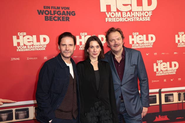 Daniel Bruehl, Christiane Paul and Charly Huebner at the öDer Held vom Bahnhof Friedrichstrasse cinema premiere on 2 12 2025 at the Delphi Filmpalast in Berlin Der Held vom Bahnhof Friedrichstrasse film premiere in Berlin