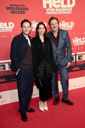 Daniel Bruehl, Christiane Paul and Charly Huebner at the öDer Held vom Bahnhof Friedrichstrasse cinema premiere on 2 12 2025 at the Delphi Filmpalast in Berlin Der Held vom Bahnhof Friedrichstrasse film premiere in Berlin