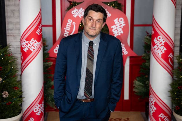 Michael Showalter, the director, co-writer and producer, arrives for the Oh. What. Fun. movie premiere on Tuesday, Dec. 2, 2025. The movie, starring Michelle Pfeiffer, will be available for streaming on Amazon Prime starting December 3.  NYP20251202910 ANGELINAxKATSANIS