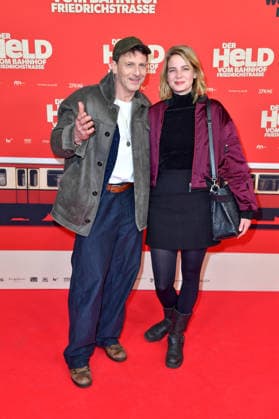 Hendrik Duryn and Rike Schmid at the premiere of DER HELD VOM BAHNHOF FRIEDRICHSTRASSE at the Delphi Filmpalast in Berlin 02 12 2025