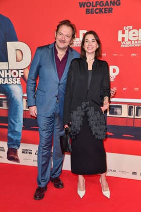 Charly Hübner and Christiane Paul at the premiere of DER HELD VOM BAHNHOF FRIEDRICHSTRASSE at the Delphi Filmpalast in Berlin 02 12 2025